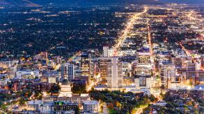 Aerial view of Utah State Capitol and Salt Lake City skyline at dusk. Salt Lake City, is the capital and most populous city of the U.S. state of Utah