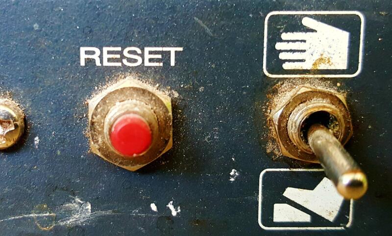 buttons on control panel of an old diry and dusty electric device image