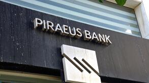 Greek Piraeus Bank building along 25is Avgoustou, Heraklion, Crete, Greece, Europe.