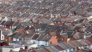 Aerial view of rows of houses and rooftops, in Portsmouth, Hampshire, UK