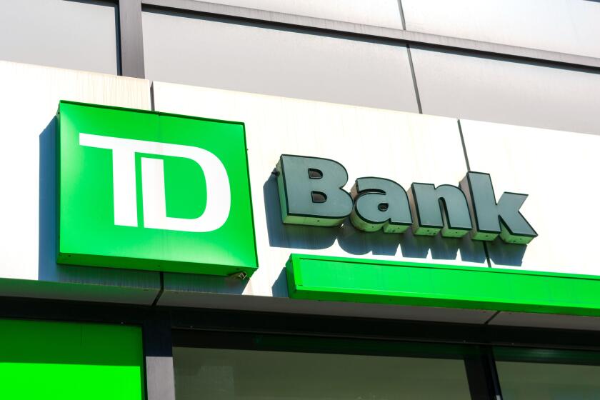 TD Bank sign, logo on bank branch. TD Bank, N.A., is an American national bank and subsidiary of the Canadian multinational Toronto-Dominion Bank - Ne