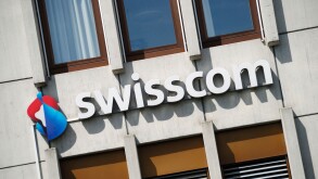 Swisscom AG telecommunications provider sign logo on the side of a building, Switzerland