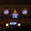 Hamburg, Germany. 13th Mar, 2025. Numerous illuminated signs with inscriptions such as Stop or a red cross indicate the closure of the Elbe Tunnel. A warning strike at the tunnel operations center has paralyzed traffic in Hamburg's Elbe Tunnel. Credit: Jo