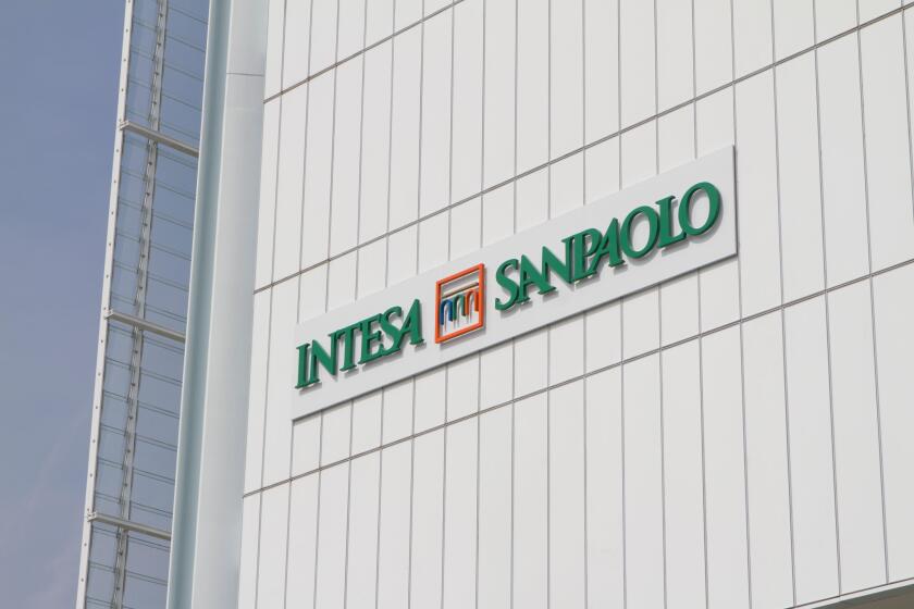 Torino, Italy. 10th April 2015. The Intesa Sanpaolo logo on the skyscraper, designed by architect Renzo Piano as new headquarters of the bank.