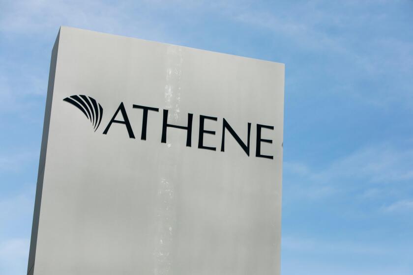 A logo sign outside of a facility occupied by Athene Holding in West Des Moines, Iowa, on June 30, 2018.