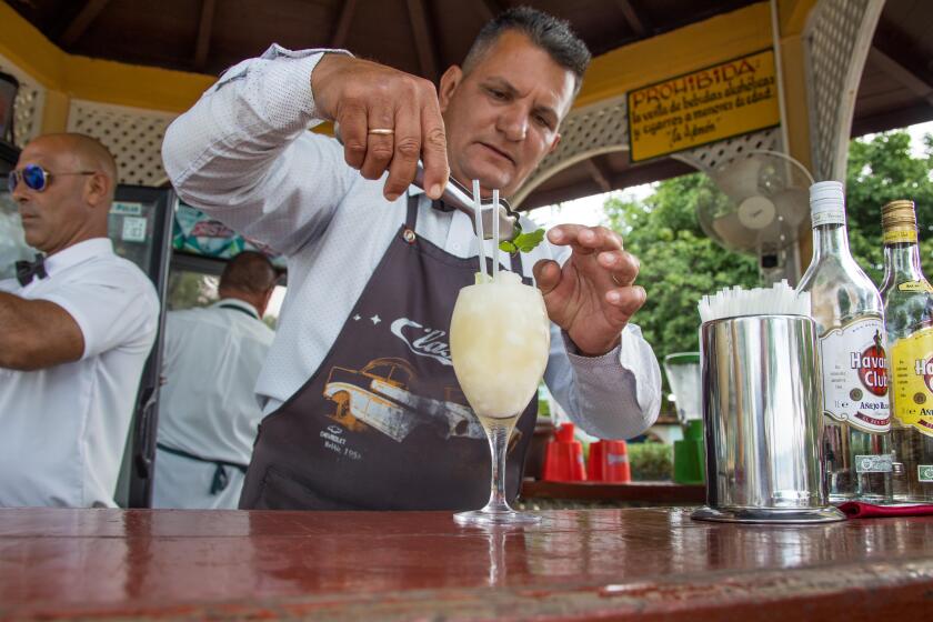 Bartender making a daiquiri with Havana Club Rum in Cienfuegos, Cuba