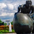Paris, France. Hans Marks's "Sisyphe" (Sisyphus) on Avenue Charles de Gaulle. The arch of triumph can be seen in the background.