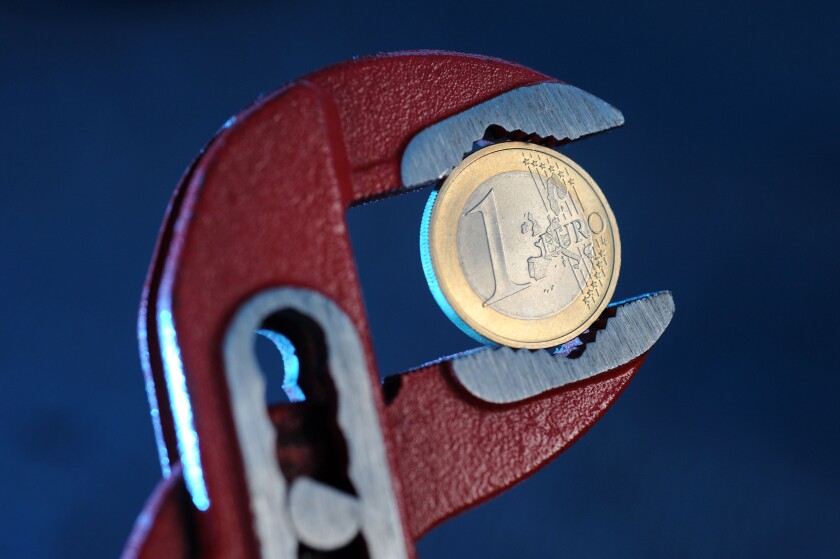 1 Euro coin in an adjustable wrench