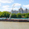 Construction work in progress by Victoria Embankment, London for the Thames Tideway Tunnel super sewer project under construction under the Thames