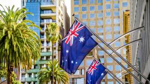 Australian flags outside Department of Justice Building Spring Street Melbourne Australia