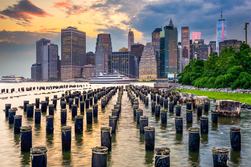 New York City, USA city skyline on the East River.