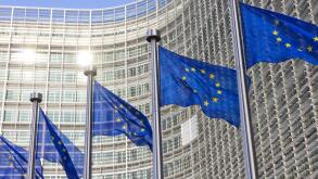 Flags in front of the EU Commission building in Brussels