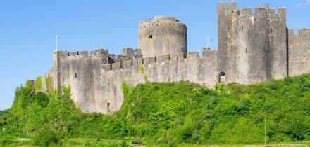 Pembroke castle wall and moat Pembroke Pembrokeshire Wales UK GB Europe - Castell Penfro