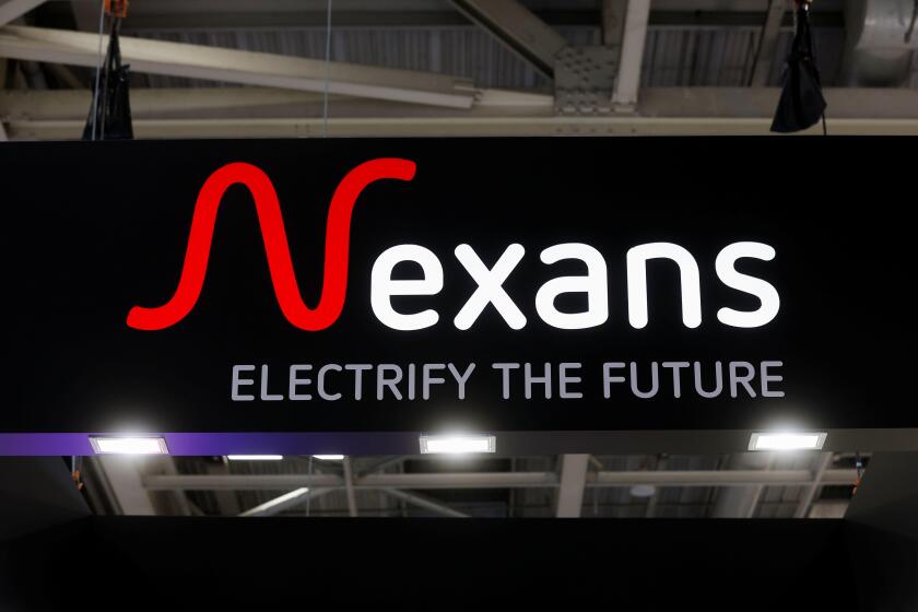A logo of Nexans is seen at its booth, at the Rexel Expo, at Porte de Versailles exhibition center in Paris, France June 20, 2022. REUTERS/Benoit Tessier