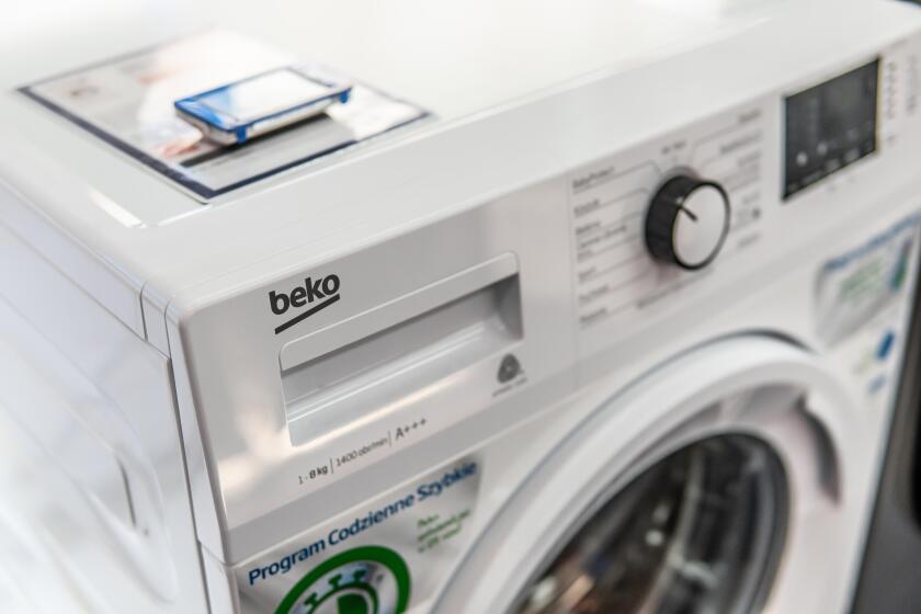 Lodz, Poland, July 2018 inside Saturn electronic store, free-standing Beko washing machine on display, produced by Beko, Turkish brand of Arcelik