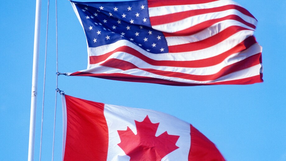 USA and Canadian Flags at the Canadian American border