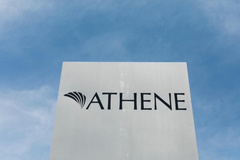 A logo sign outside of a facility occupied by Athene Holding in West Des Moines, Iowa, on June 30, 2018.