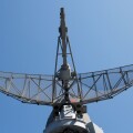 Modern military ship radar station against the sky