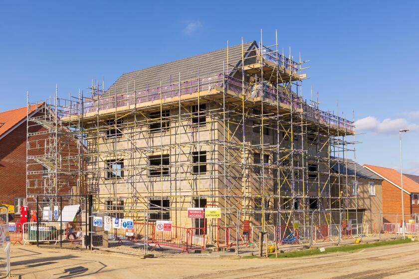 Apartments under construction by Bovis in the new Stortford Fields housing development in Bishop's Stortford, UK.