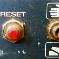 buttons on control panel of an old diry and dusty electric device image
