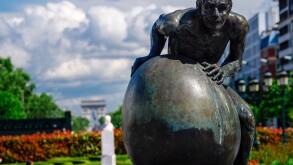 Paris, France. Hans Marks's "Sisyphe" (Sisyphus) on Avenue Charles de Gaulle. The arch of triumph can be seen in the background.
