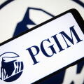 In this photo illustration, PGIM, Inc. (formerly Prudential Investment Management) logo is seen displayed on a smartphone screen and in the background. (Photo by Pavlo Gonchar / SOPA Images/Sipa USA)