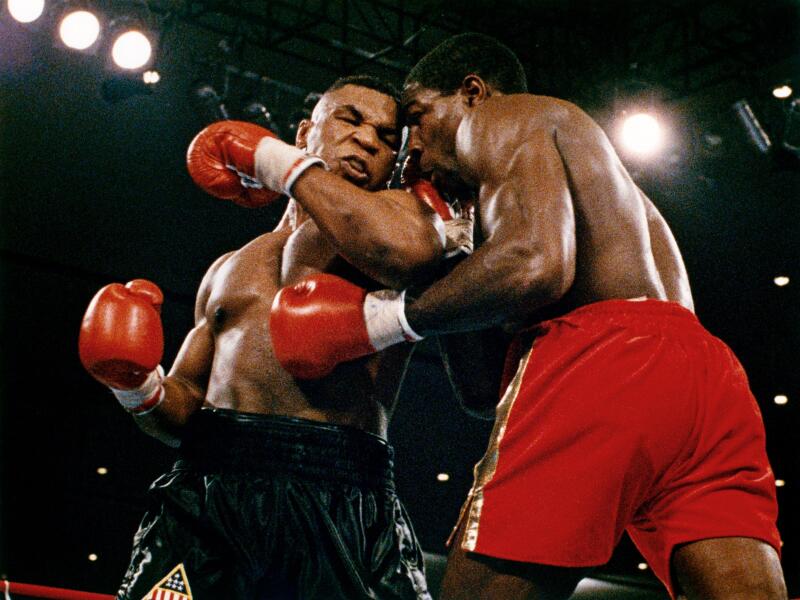 Mike Tyson vs. Frank Bruno for the WBA, WBC, IBF and lineal heavyweight championships. Tyson defeated Bruno by way of TKO in round five.25th February 1989