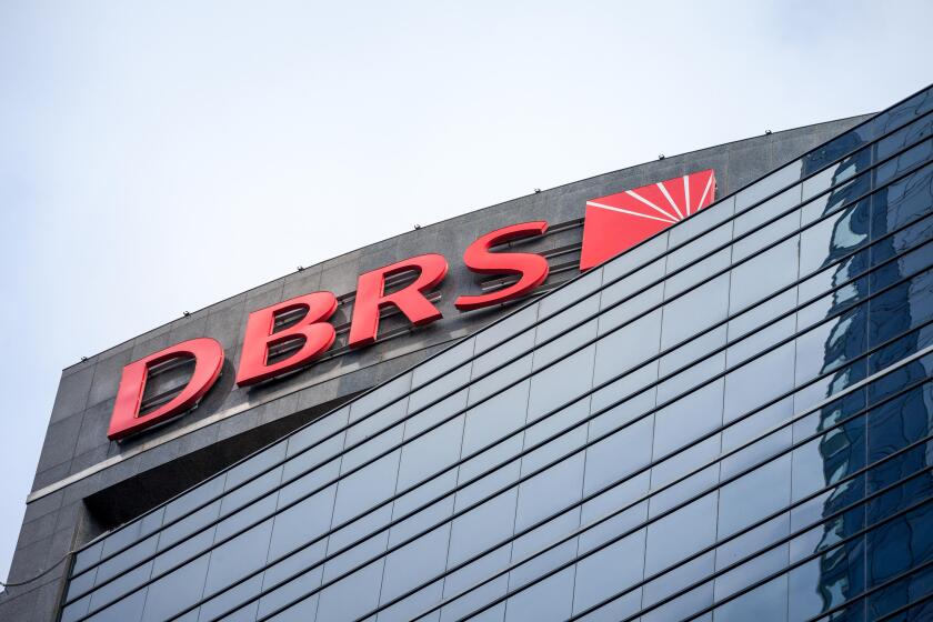 TORONTO, CANADA - NOVEMBER 14, 2018:  DBRS logo on their main office in Toronto, Ontario. DBRS is a Canadian Credit Rating Agency (CRA) spread worldwi