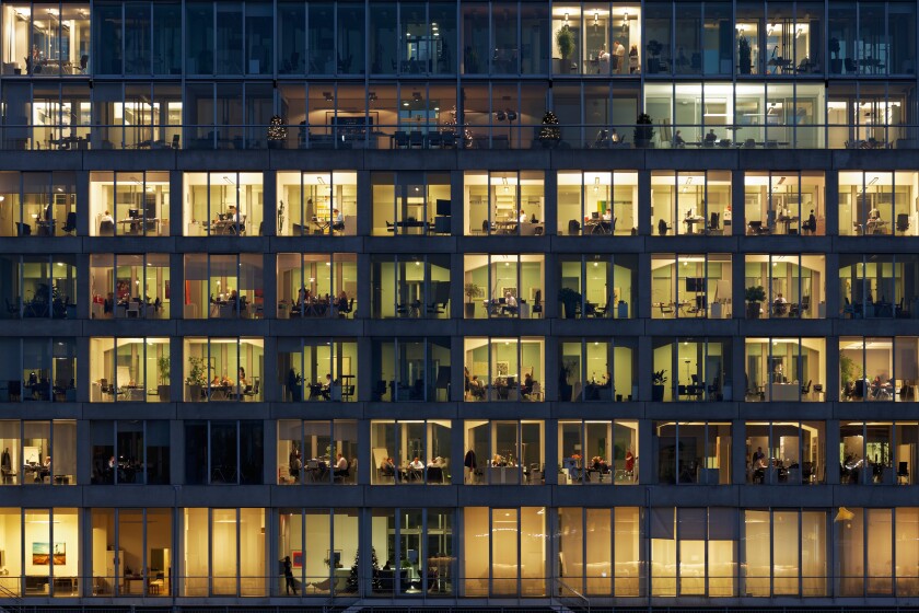 Office buildings with lighted windows, people at work, Media Harbour, Dusseldorf, North Rhine-Westphalia, Germany