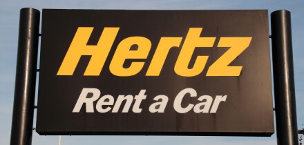 A Hertz Rent a Car sign close to Heathrow Airport, London, UK.