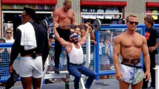 Men lifting weights at Muscle Bach in Venice Beach, CA