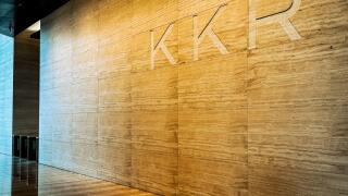 Signage for private equity firm KKR in the entrance lobby to 30 Hudson Yards, New York, USA