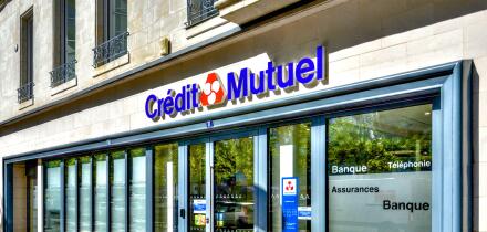 Facade and entrance to a city center branch of the "Credit Mutuel" national bank - Chatellerault, Vienne (86), France.