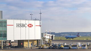 HSBC advertisement, - the HSBC logo at Heathrow airport UK