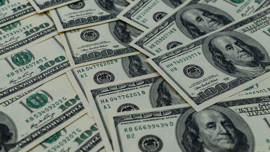 A multitude of laid-out and overlapping US hundred-dollar bills