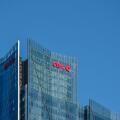 CIBC bank logo sign on a highrise glass office building downtown Toronto Ontario Canada on October 5, 2024