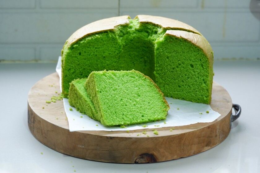 Sliced of fluffy pandan chiffon cake-green-esg-adobe-2022