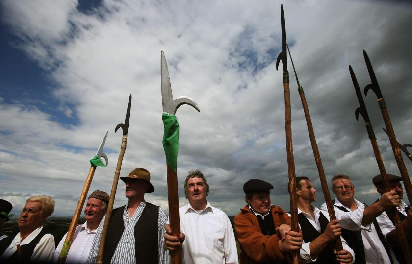 Irish rebels prepare for battle during the Vinegar Hill Battle Re-enactment at Enniscorthy, Co Wexford, Ireland.