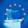 Open sign in the middle of the European Flag, concept of Re-opening in Europe after Coronavirus.