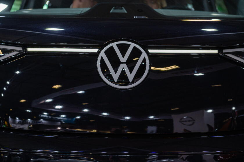 Riga, Latvia, April 28, 2023: Volkswagen emblem on new minivann ID. BUZZ, close-up
