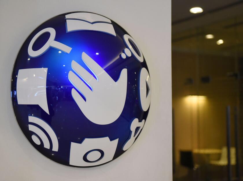 A logo of Globe Telecom is seen at a Globe service center in Edsa, Quezon City, metro Manila, Philippines, May 7, 2018. Picture taken May 7, 2018. REUTERS/Dondi Tawatao