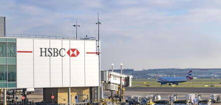 HSBC advertisement, - the HSBC logo at Heathrow airport UK