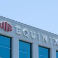 Close up of Equinix logo sign on the building at its headquarters in Redwood City, California, USA.