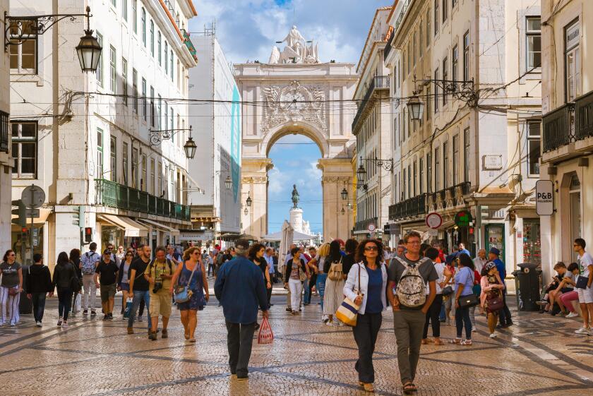 Lisbon city center, view of the Rua Augusta - the main thoroughfare in the historical centre of Lisbon, Portugal.