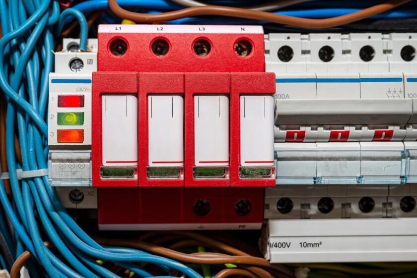 Surge arrester used to protect the electrical system in the building during electrical discharges, storm protection and three-phase fuse.