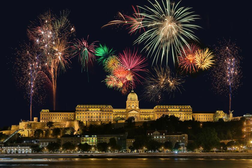 Fireworks display above Buda Castle or the Royal Palace in the city of Budapest in Hungary.
