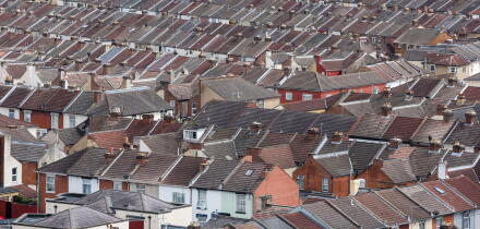 Aerial view of rows of houses and rooftops, in Portsmouth, Hampshire, UK