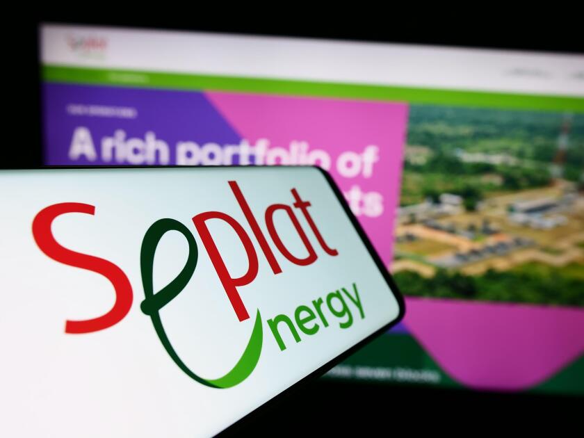Cellphone with logo of Nigerian oil company Seplat Energy plc in front of business website. Focus on center of phone display.