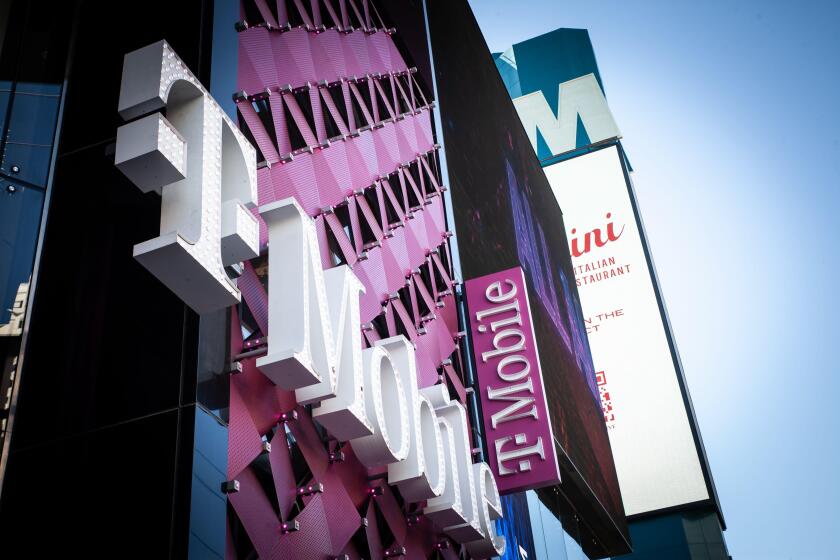 LAS VEGAS - AUGUST 18, 2024: The T-Mobile logo on a store in Las Vegas, USA. T-Mobile USA is one of the main mobile network operator in America belong