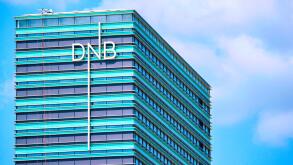 Vilnius, Lithuania - May 6, 2017: Office of DNB bank at modern skyscraper in downtown, Vilnius, Lithuania